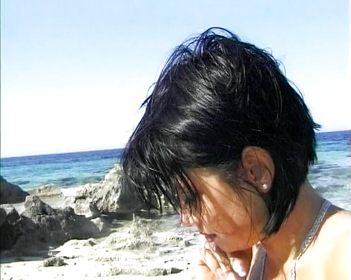 A hot German chick gets double penetrated on the beach